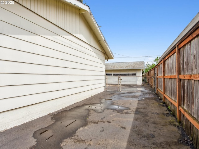 4118 SE 132nd Ave, Portland, OR 97236 - view of home's exterior with a gate