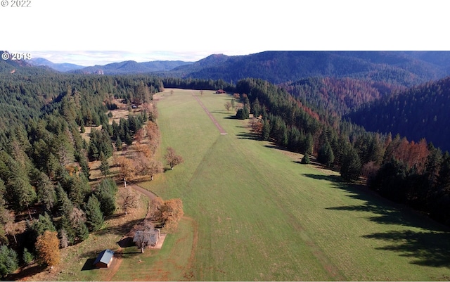 bird's eye view featuring a rural view and a mountain view