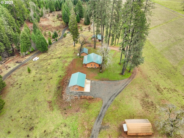 birds eye view of property featuring a rural view