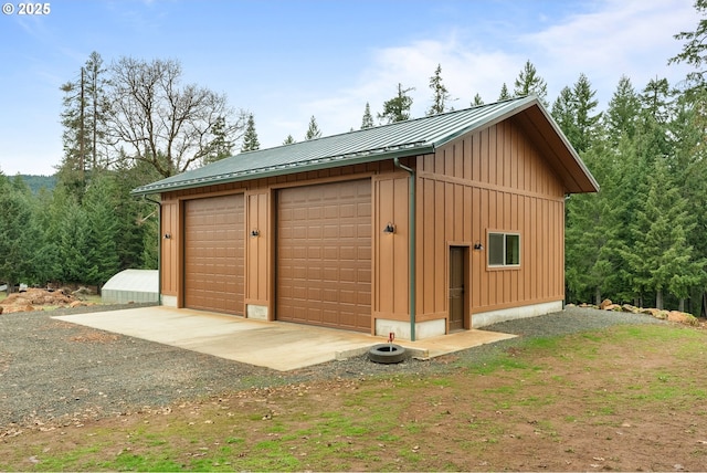 view of outdoor structure featuring a garage