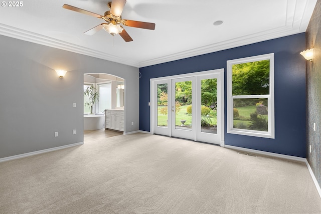 4220 NE 171st Ave, Vancouver, WA 98682 - unfurnished room featuring carpet, healthy amount of natural light, arched walkways, and crown molding