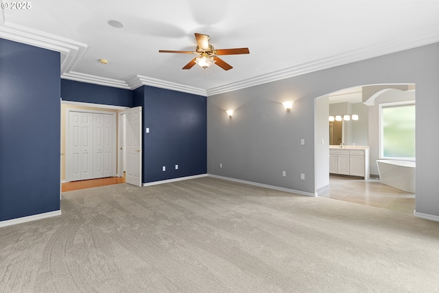 4220 NE 171st Ave, Vancouver, WA 98682 - carpeted empty room featuring ceiling fan, arched walkways, and crown molding