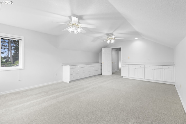 4220 NE 171st Ave, Vancouver, WA 98682 - additional living space featuring vaulted ceiling, a ceiling fan, and light colored carpet