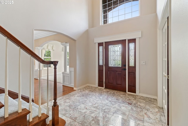 4220 NE 171st Ave, Vancouver, WA 98682 - entrance foyer with arched walkways, plenty of natural light, decorative columns, stairway, and a high ceiling
