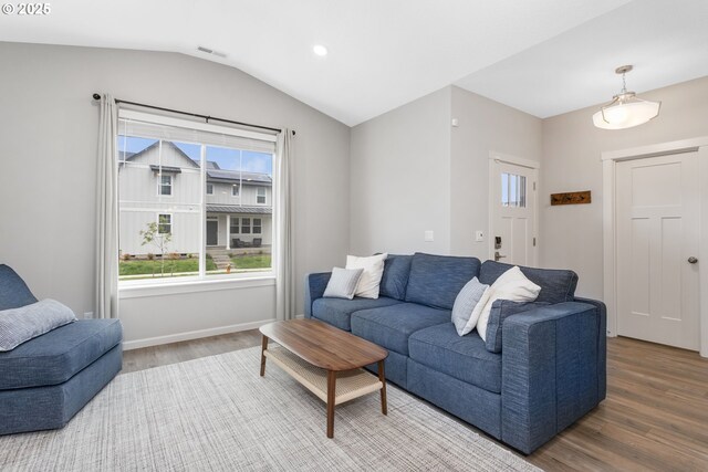 31380 NW Turel Dr, North Plains, OR 97133 - living area with wood finished floors, plenty of natural light, lofted ceiling, baseboards, and recessed lighting