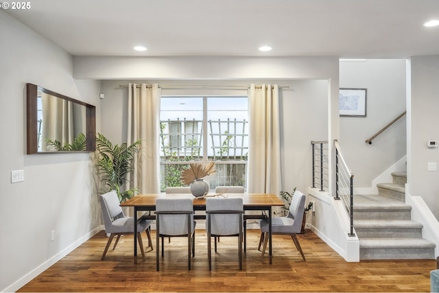 dining area featuring hardwood / wood-style floors