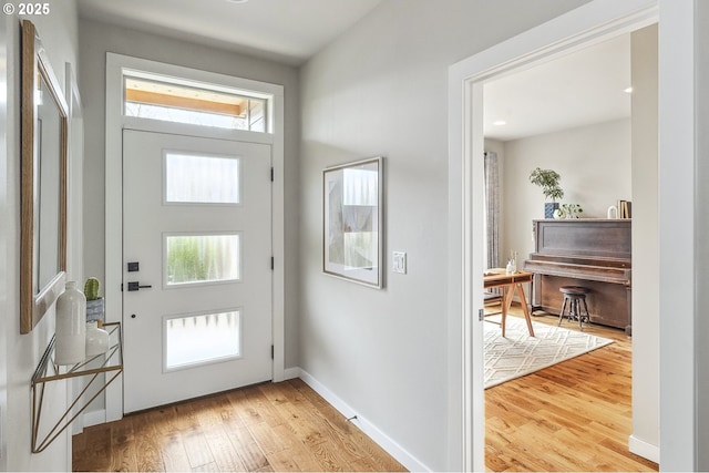 doorway to outside with hardwood / wood-style floors