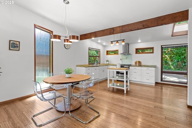 3115 NW Cornell Rd, Portland, OR 97210 - dining space with plenty of natural light, light wood finished floors, baseboards, and recessed lighting