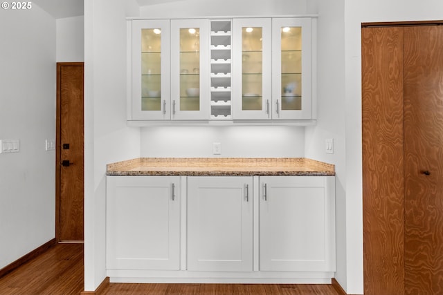 3115 NW Cornell Rd, Portland, OR 97210 - bar area featuring wood finished floors and baseboards