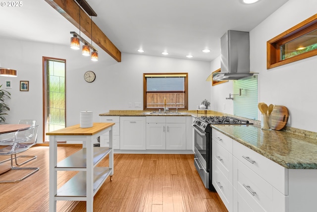 3115 NW Cornell Rd, Portland, OR 97210 - kitchen featuring gas range, range hood, a sink, recessed lighting, and white cabinets