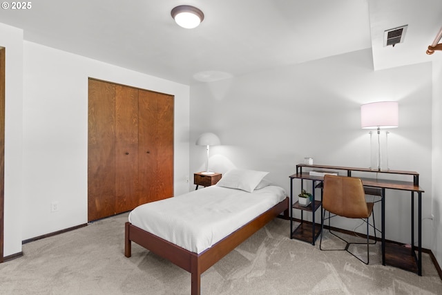 3115 NW Cornell Rd, Portland, OR 97210 - bedroom featuring carpet floors, a closet, and baseboards