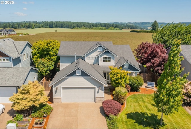 30809 NW Yorkshire St, North Plains, OR 97133 - view of front of house featuring driveway and a shingled roof