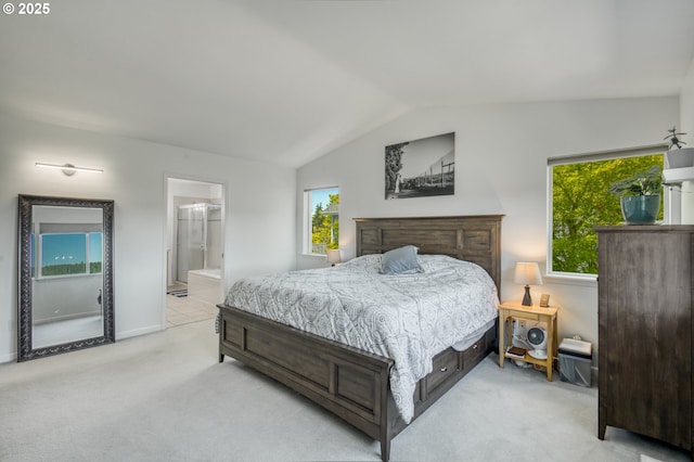 30809 NW Yorkshire St, North Plains, OR 97133 - carpeted bedroom with vaulted ceiling, multiple windows, connected bathroom, and baseboards