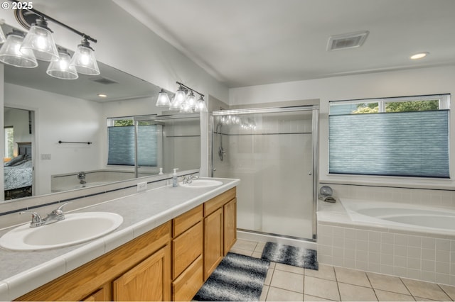30809 NW Yorkshire St, North Plains, OR 97133 - full bath featuring tile patterned flooring, a bath, ensuite bath, and a shower stall