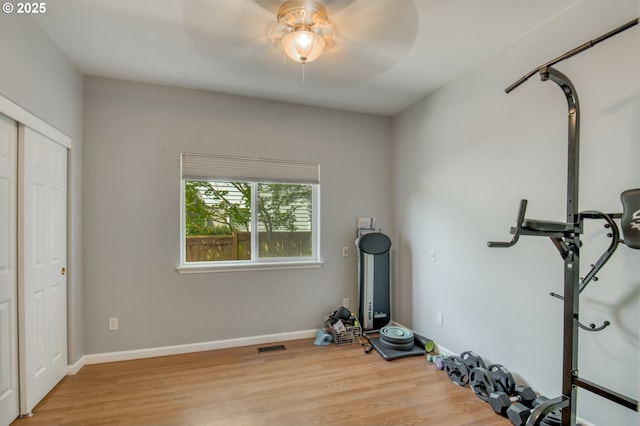 30809 NW Yorkshire St, North Plains, OR 97133 - workout area with a ceiling fan, light wood-type flooring, and baseboards