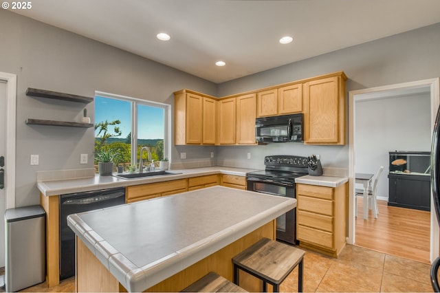 30809 NW Yorkshire St, North Plains, OR 97133 - kitchen with black appliances, a sink, light brown cabinetry, tile countertops, and recessed lighting