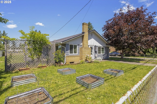 11547 NE San Rafael St, Portland, OR 97220 - view of property exterior featuring a vegetable garden and a chimney