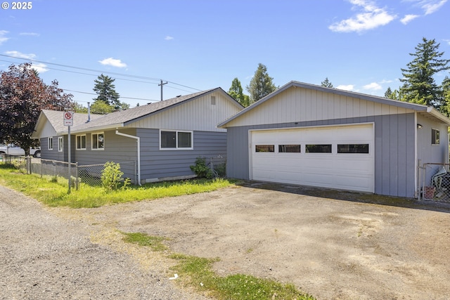 11547 NE San Rafael St, Portland, OR 97220 - view of front of house with a detached garage and an outdoor structure