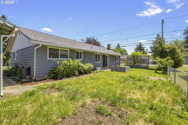 11547 NE San Rafael St, Portland, OR 97220 - rear view of property with a shingled roof and a chimney