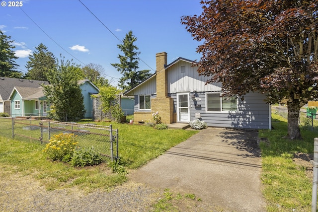 11547 NE San Rafael St, Portland, OR 97220 - view of front of property featuring a chimney and driveway