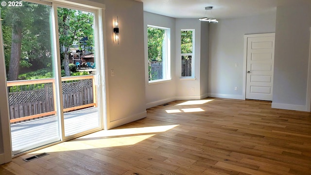 13511 SE Barbara Jean Ct, Clackamas, OR 97015 - empty room with hardwood / wood-style floors and baseboards