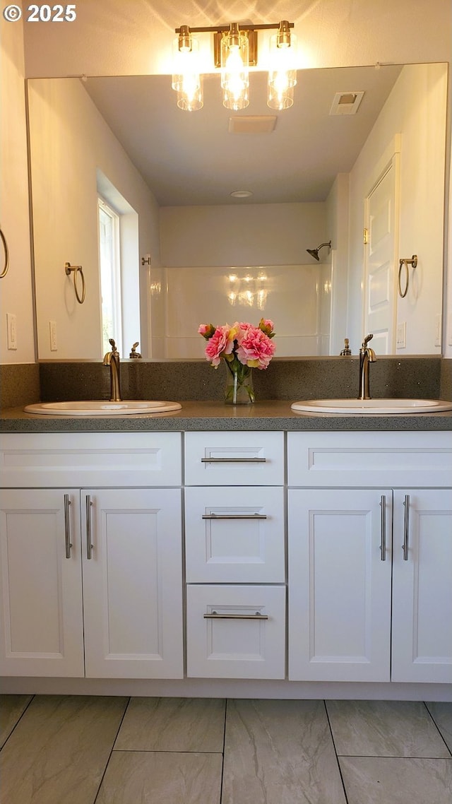 13511 SE Barbara Jean Ct, Clackamas, OR 97015 - full bathroom with marble finish flooring, double vanity, and a shower
