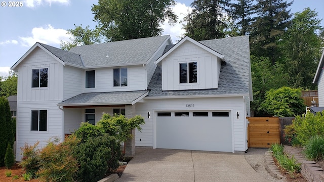 13511 SE Barbara Jean Ct, Clackamas, OR 97015 - modern farmhouse style home featuring concrete driveway, board and batten siding, an attached garage, and roof with shingles