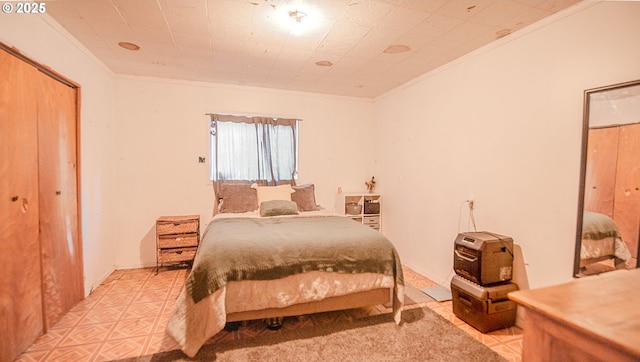 bedroom featuring ornamental molding