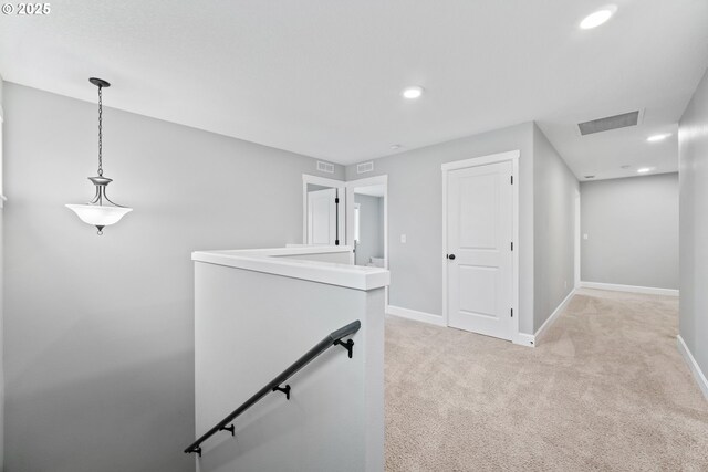 4342 S 16th Way, Ridgefield, WA 98642 - corridor featuring an upstairs landing, baseboards, light colored carpet, and recessed lighting