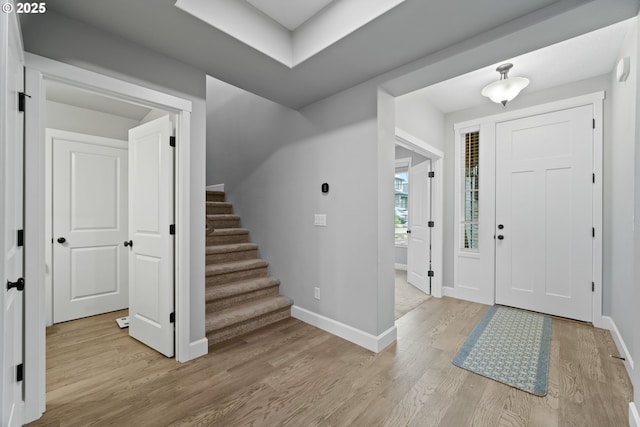 4342 S 16th Way, Ridgefield, WA 98642 - foyer featuring light wood-type flooring, baseboards, and stairway