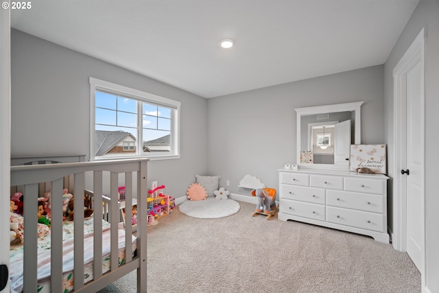 4342 S 16th Way, Ridgefield, WA 98642 - carpeted bedroom with a crib, baseboards, and recessed lighting