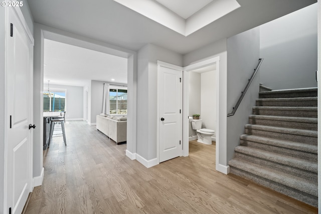 4342 S 16th Way, Ridgefield, WA 98642 - foyer entrance featuring light wood-style flooring, stairway, and baseboards
