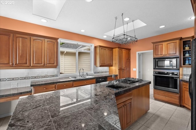 14255 SW Parmele Rd, Gaston, OR 97119 - kitchen with black appliances, a sink, tile countertops, brown cabinets, and decorative backsplash