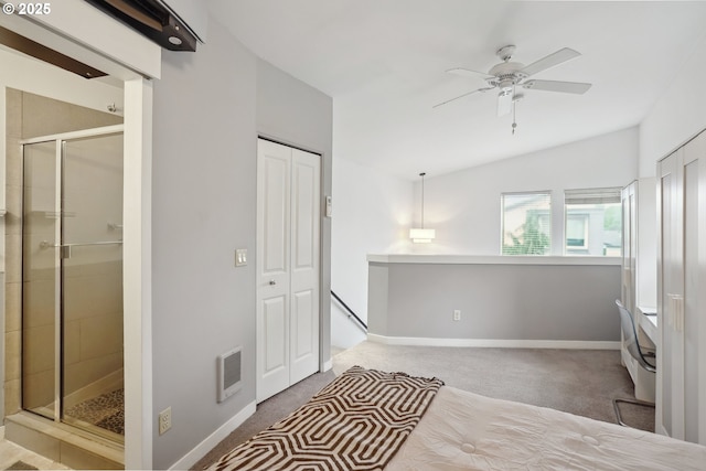 bedroom with carpet, vaulted ceiling, baseboards, and ceiling fan