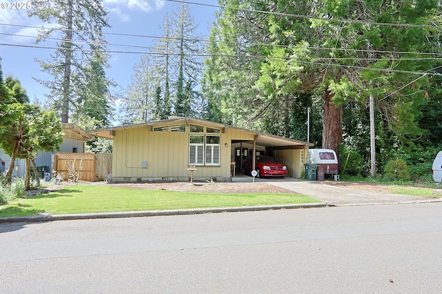 1695 N 17th St, Coos Bay, OR 97420 - view of front of house featuring driveway and an attached carport