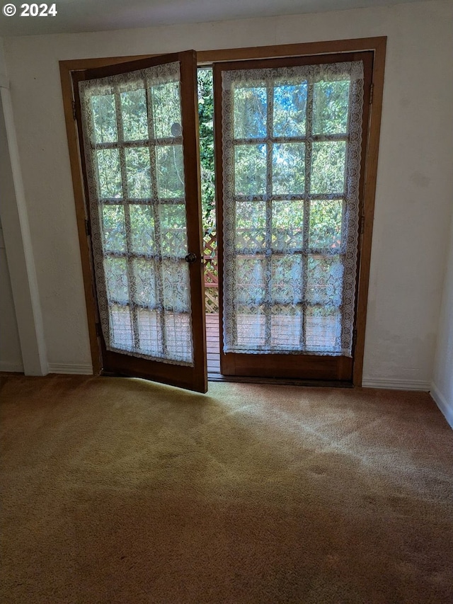 1695 N 17th St, Coos Bay, OR 97420 - doorway with carpet flooring and baseboards