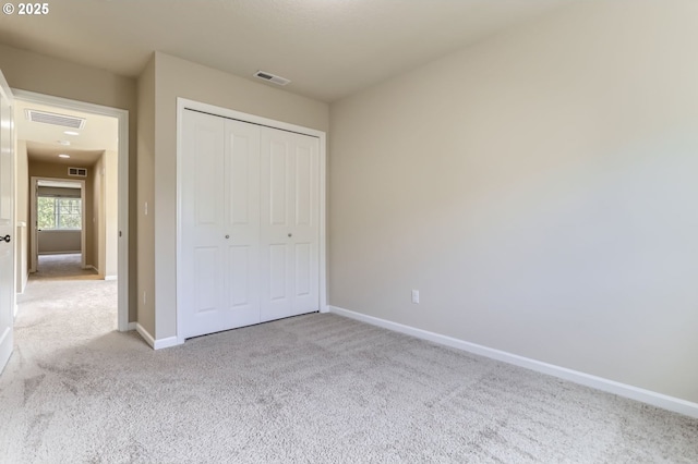 7156 NW Abigail Ter, Portland, OR 97229 - unfurnished bedroom featuring carpet floors, baseboards, visible vents, and a closet