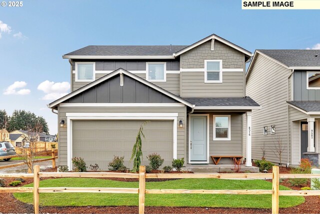 craftsman-style home featuring a front lawn