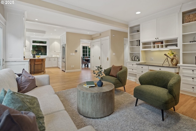 3505 SW Beaverton Ave, Portland, OR 97239 - living room featuring light wood finished floors and recessed lighting
