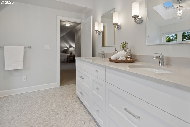 3505 SW Beaverton Ave, Portland, OR 97239 - ensuite bathroom with a skylight and double vanity