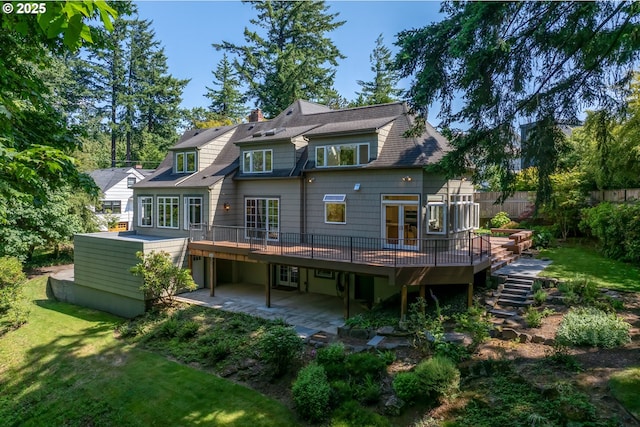3505 SW Beaverton Ave, Portland, OR 97239 - back of property with french doors, a deck, stairs, and a patio