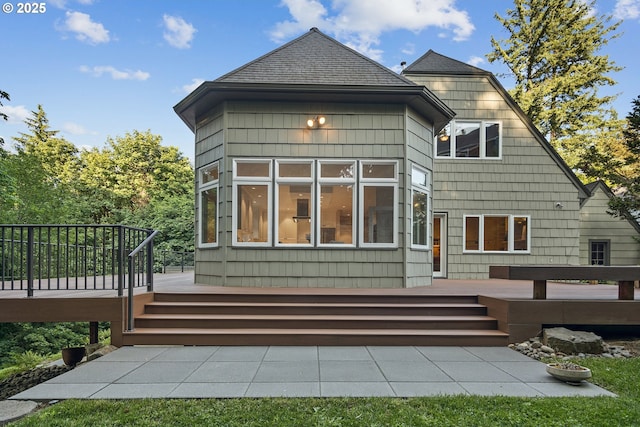 3505 SW Beaverton Ave, Portland, OR 97239 - rear view of property with a deck and roof with shingles
