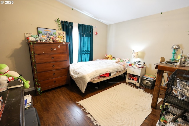 bedroom featuring wood-type flooring