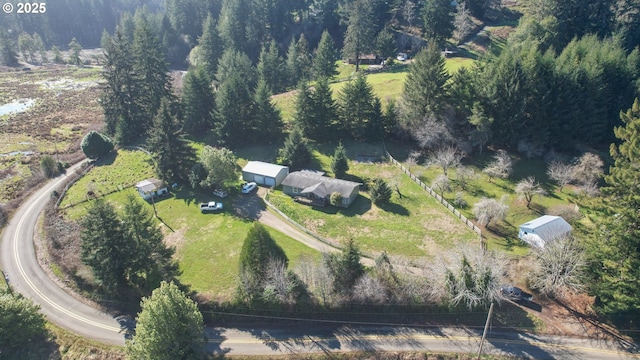 aerial view featuring a forest view