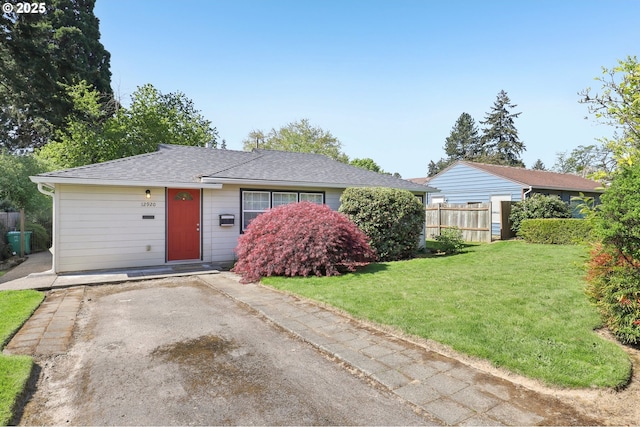 12920 SW Douglas St, Portland, OR 97225 - ranch-style home with a front lawn, roof with shingles, and fence