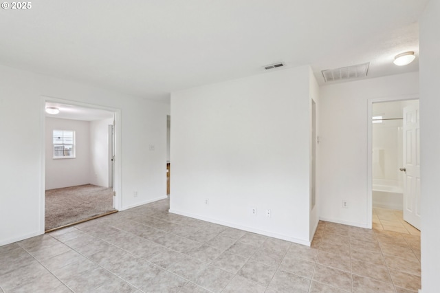 12920 SW Douglas St, Portland, OR 97225 - empty room with visible vents and light tile patterned floors