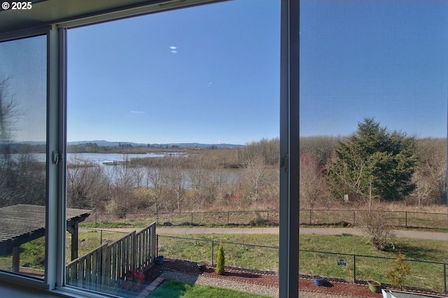 view of water feature with fence