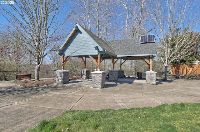 view of patio / terrace with a gazebo and fence