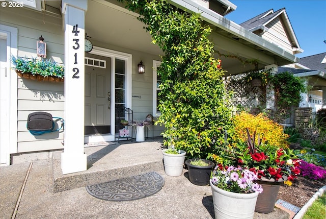 property entrance featuring a porch