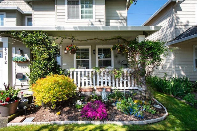 doorway to property featuring a porch